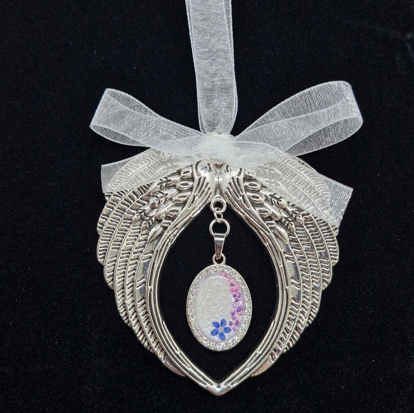 Angel wing hanging christmas decoration with cremation ashes