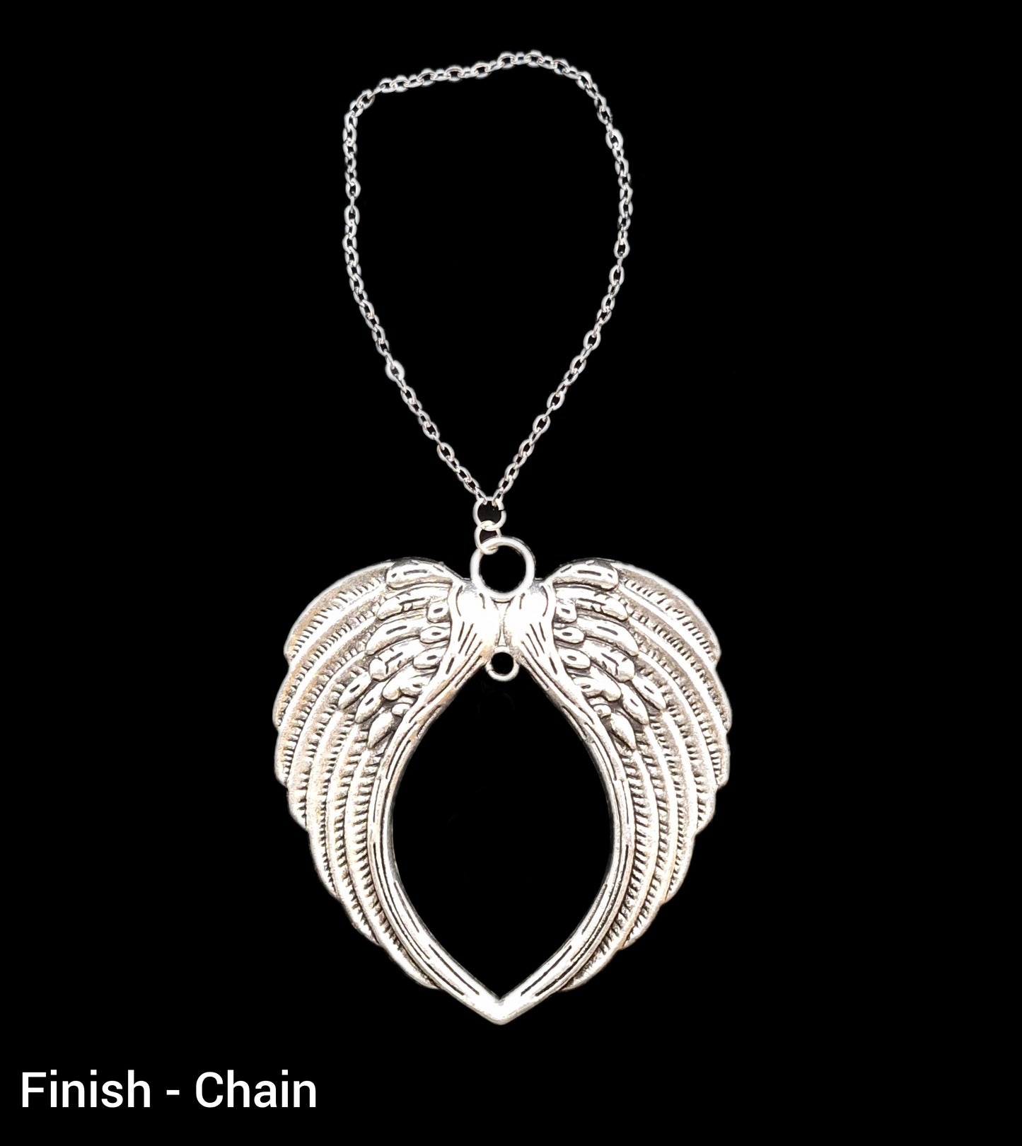 Angel wing hanging christmas decoration with cremation ashes