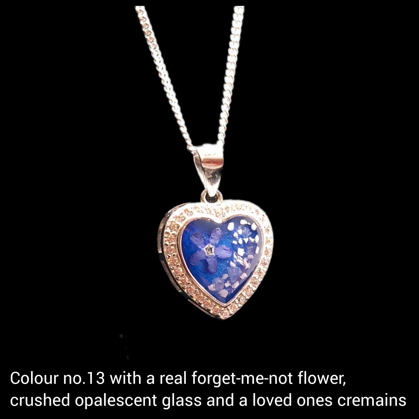 Cremation ashes heart necklace with a real forget-me-not