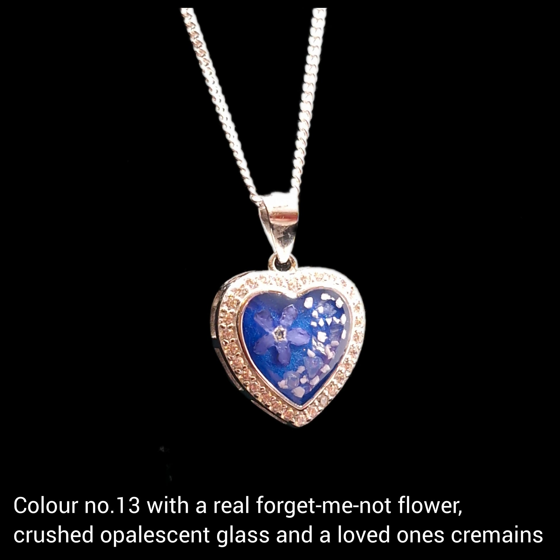Cremation ashes heart necklace with a real forget-me-not