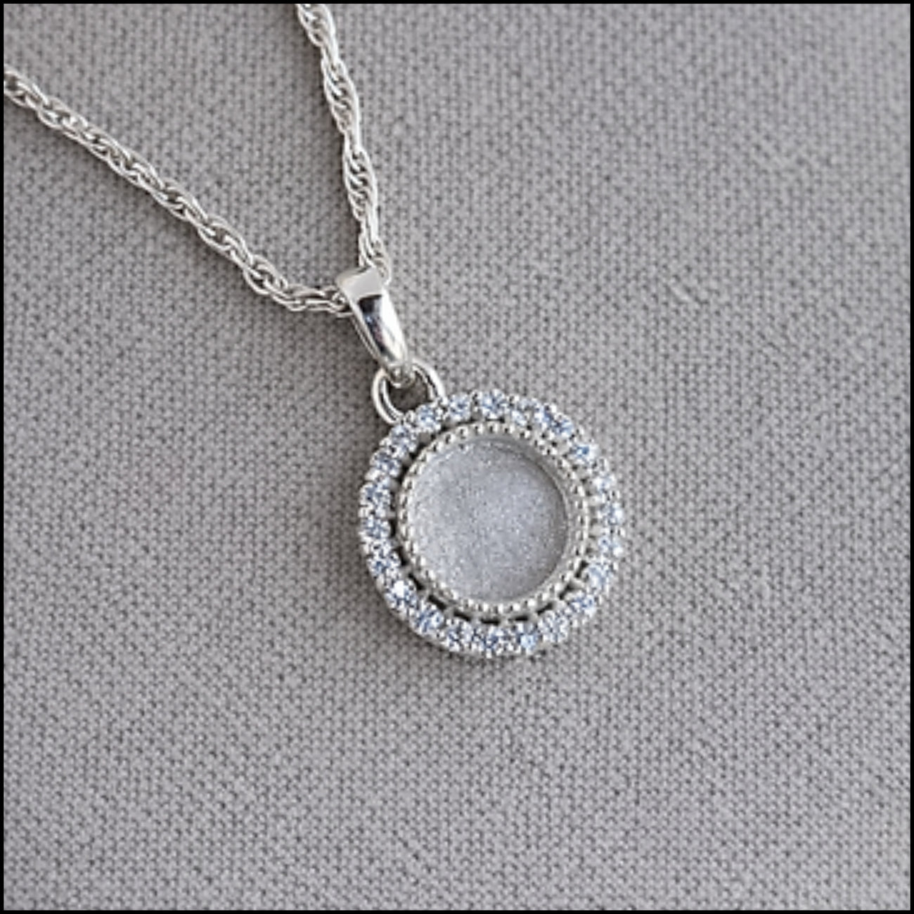 CZ halo round pendant