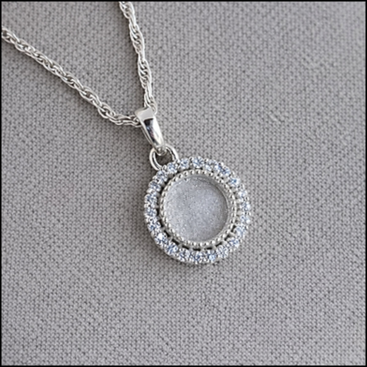 CZ halo round pendant