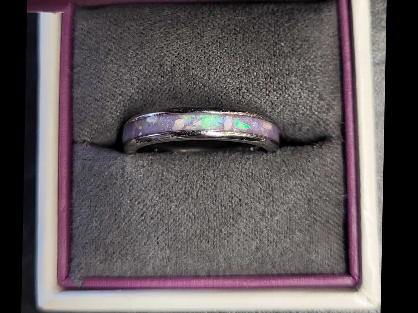 4mm channel ring containing cremation ashes, aubergine dream mica and mylar