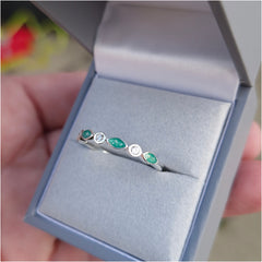 Bezel set half eternity style ring