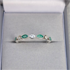 Bezel set half eternity style ring