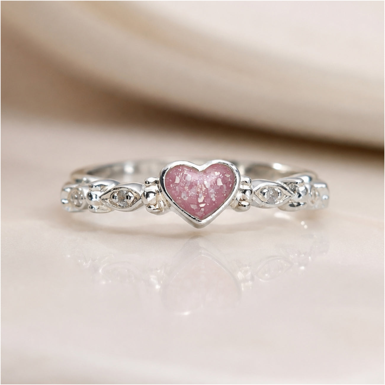 Dainty heart and almond stones ring