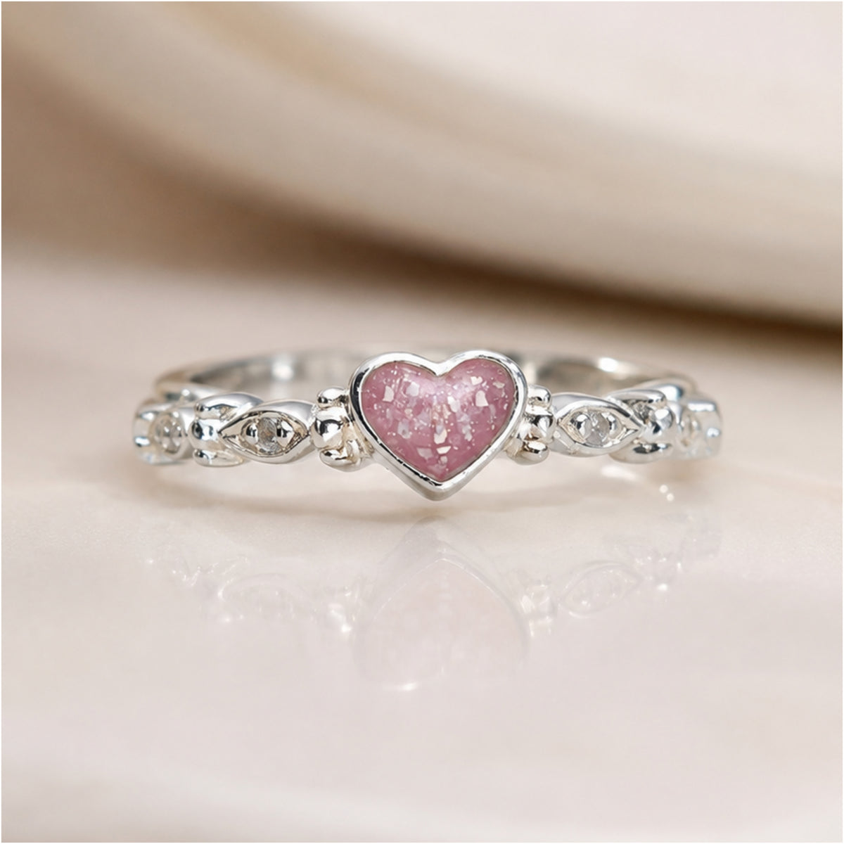 Dainty heart and almond stones ring