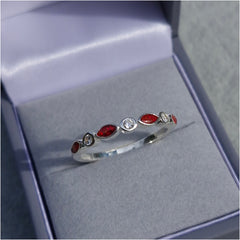 Bezel set half eternity style ring