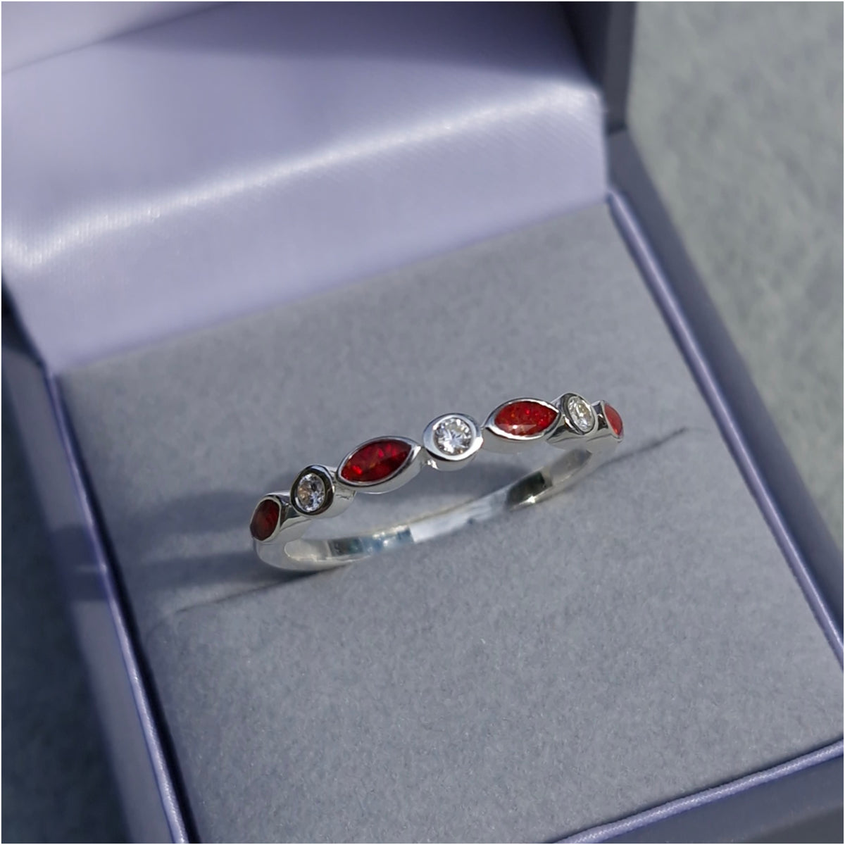 Bezel set half eternity style ring