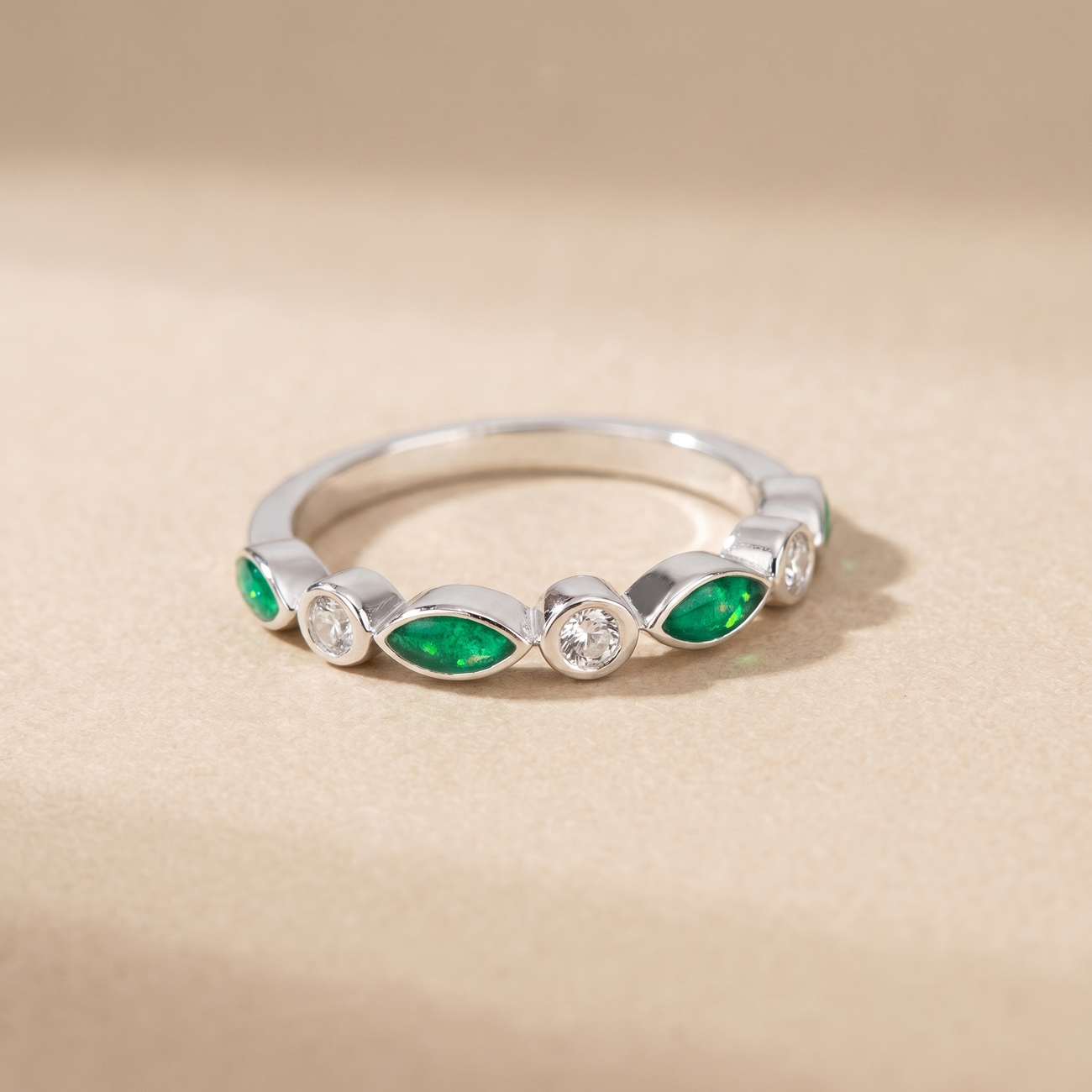Bezel set half eternity style ring