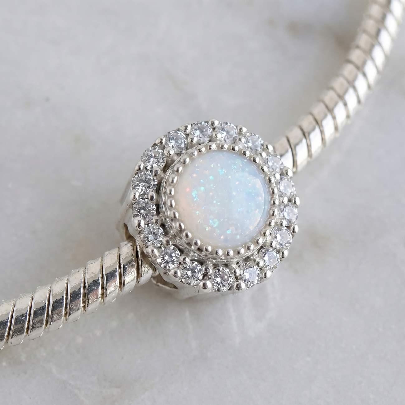 CZ halo round charm