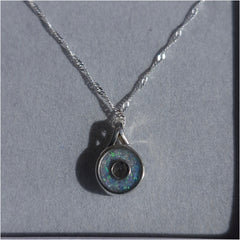 Secretly set Round pendant