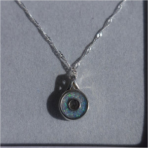 Secretly set Round pendant
